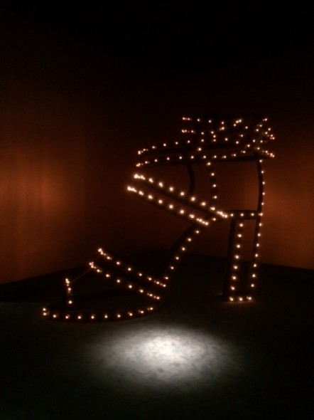 An Hermes shoe in lights, photo by Sean Rocha